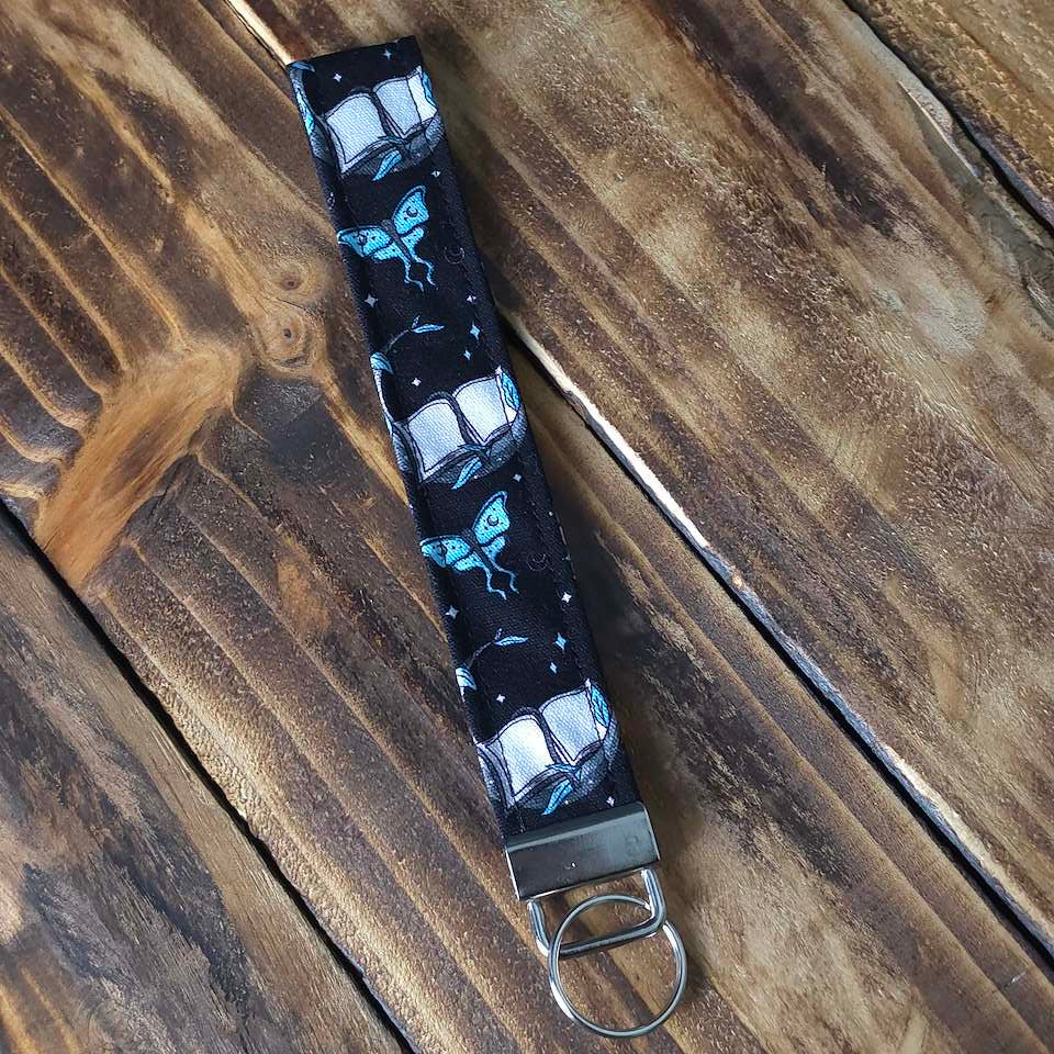 Books and Daggers | Wristlet